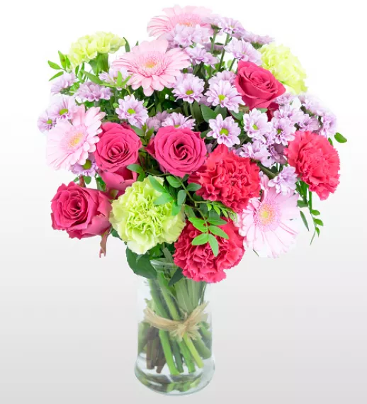 flowers - Beautiful Blossom, £29.99 - This lovely pink bouquet includes roses, stallion chrysanthemums, germinis, and carnations all beautifully complemented by lush pistacia.