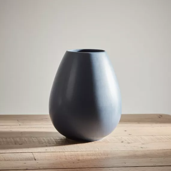 gifts - Dusty Blue Teardrop Vase, £61.99 - A charming dusty blue teardrop vase that adds a subtle touch of color and elegance to any floral arrangement.