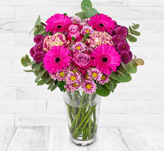 flowers - Ruby Passion, £27.99 - Introducing our new Ruby Passion bouquet which has been created by our finest florists to really bring together sunning colours.