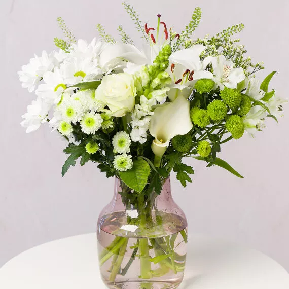 flowers - Casablanca, £29.50 - An elegant arrangement featuring a pure white Athena Rose and graceful Calla Lily, joined by soft Alstroemeria, cheerful Chrysanthemums, and elegant Snapdragon.