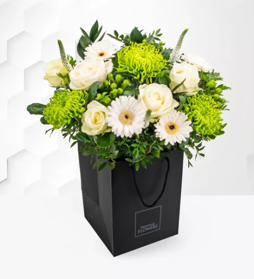 flowers - Windsor Bouquet, £59.99 - This wonderful royal bouquet is a truly elegant white rose arrangement.