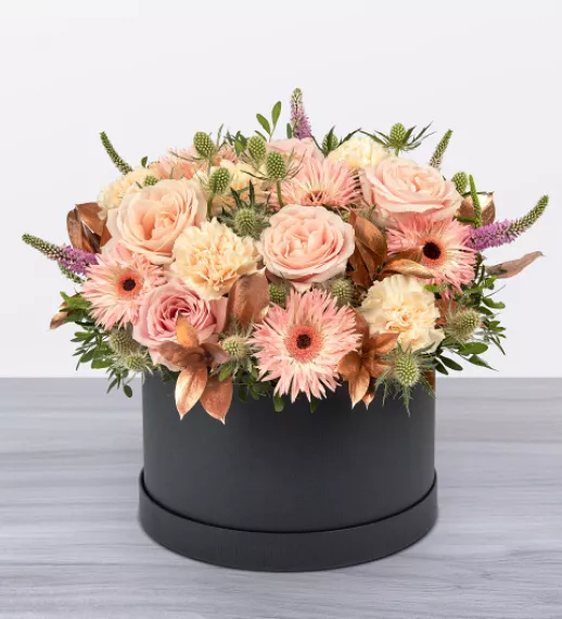 flowers - Peach Sherbet Hatbox, £89.99 - A wild and wonderful peach and pink flower arrangement perfect to show just how much you care!