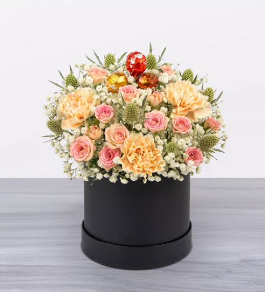flowers - Pink Lindor Mini Hatbox, £54.99 - Introducing our new Luxe Pink Lindor Hatbox, a perfect chocolate gift set lovingly created by our expert florists for special occasions like birthdays or anniversaries.