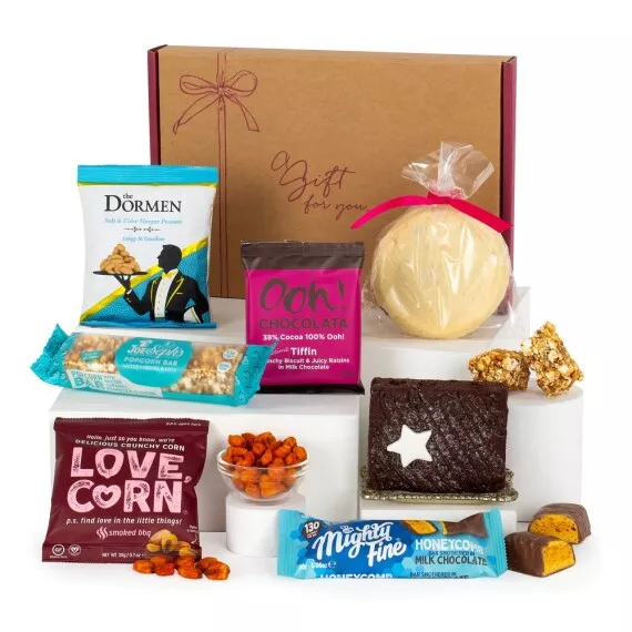 letterbox - Delectable Delights Letterbox Gift, £19.50 - The Delectable Delights Letterbox Gift is a charming, letterbox-sized gift with a mix of the finest sweet and savory snacks for your recipient to enjoy.