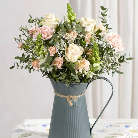 flowers - Secret Garden, £29.95 - An elegant collection of peach Roses and Carnations with complementing white Snapdragon.