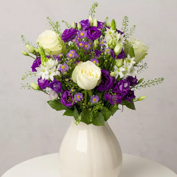 letterbox - Royal Velvet Letterbox, £30.75 - Add a touch of regal elegance to any space with a beautiful blend of white Roses, striking deep purple Lisianthus, and delicate lilac Aster.