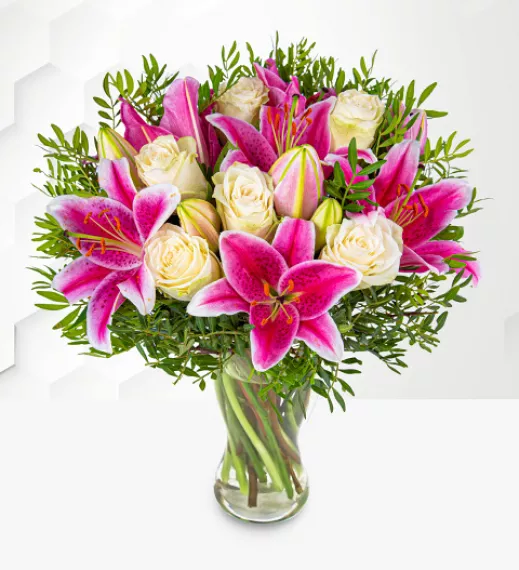 flowers - Pink Lily and Rose Bouquet, £39.99 - Indulge someone with a beautiful pink and white flower arrangement.