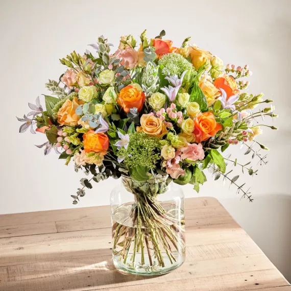 flowers - Elysian Glow, £90.00 - A radiant bouquet featuring warm, golden tones that bring a sense of blissful happiness.