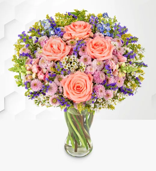 flowers - Oceanic Delight Bouquet, £38.99 - This top-selling blue, white, and pink flower arrangement is a delightful mix of vibrant colors and elegant textures.