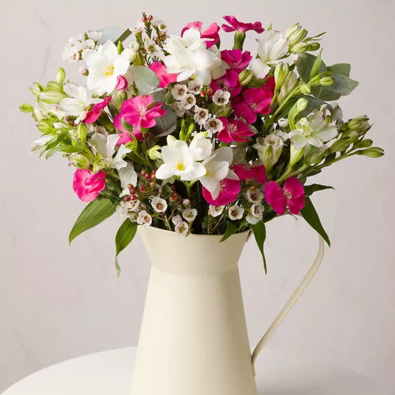 letterbox - Pink Parfait Letterbox, £27.50 - A charming mix of vibrant pink and white Carnations, this bouquet is complemented by Alstroemeria, delicate Waxflower, and Eucalyptus.