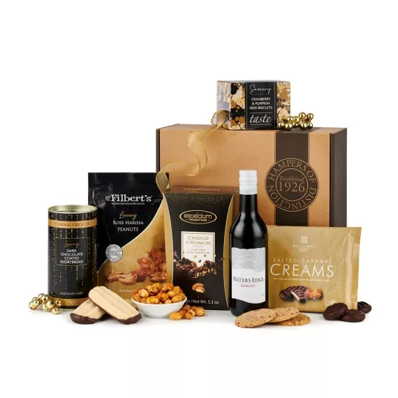 hampers - Wine and Treats Gift Box, £22.65 - The perfect pairing for a quiet evening in, our Wine and Treats Gift Box is packed with a delicious range of sweet and savory treats to be enjoyed with a Waters Edge Merlot.