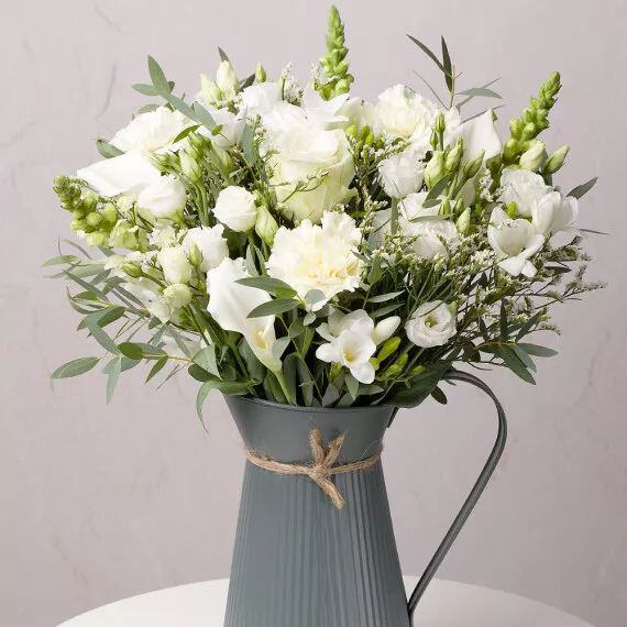 flowers - Serendipity, £49.75 - An exquisite arrangement featuring elegant white Calla Lilies gracefully surrounded by white Lisianthus and a beautiful white Rose.