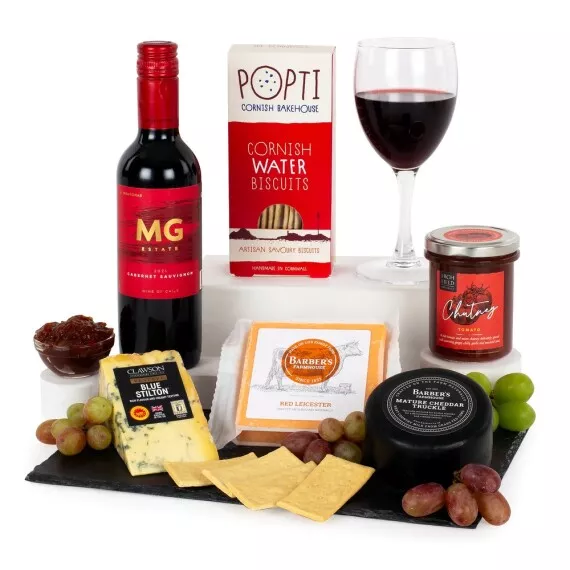 hampers - Cheese and Wine Slate, £39.75 - Our Cheese and Wine Slate comprises three scrumptious cheeses, a jar of tomato chutney, crackers, and an excellent bottle of Cabernet Sauvignon.