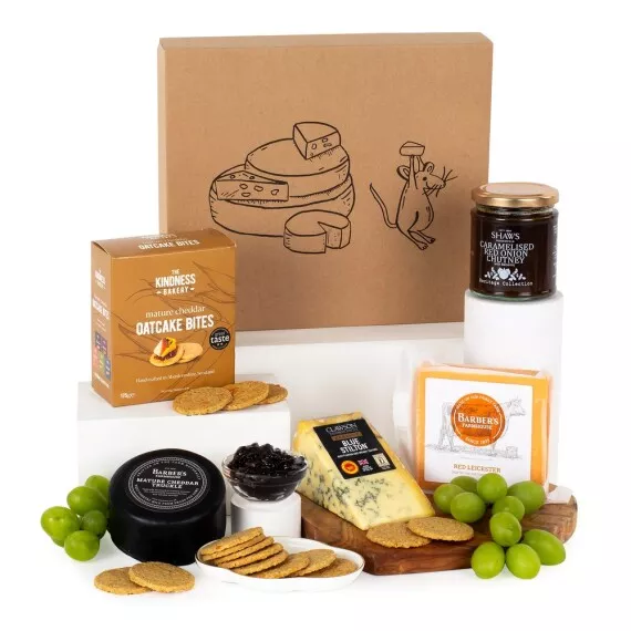 hampers - The Big Cheese Box, £26.75 - Indulge in the gourmet flavors of our cheese and treats gift, featuring a selection of artisan cheese, caramelized red onion chutney, and oatcake bites.