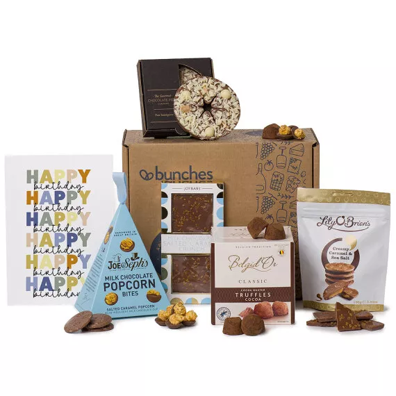 hampers - Salted Caramel Birthday Hamper, £30.95 - A hamper for those who love all things chocolatey, including cocoa truffles, milk chocolate popcorn bites, and a salted caramel crunch slab.