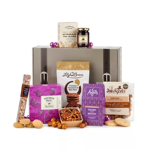 hampers - Tea & Treats Gifts Box, £33.60 - Savor the ritual of a traditional afternoon tea with a hamper filled with classic treats.