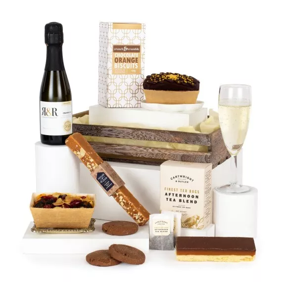 hampers - Tea and Bubbles, £35.25 - A selection of English Breakfast tea, cherry and almond cake, and a bottle of prosecco.