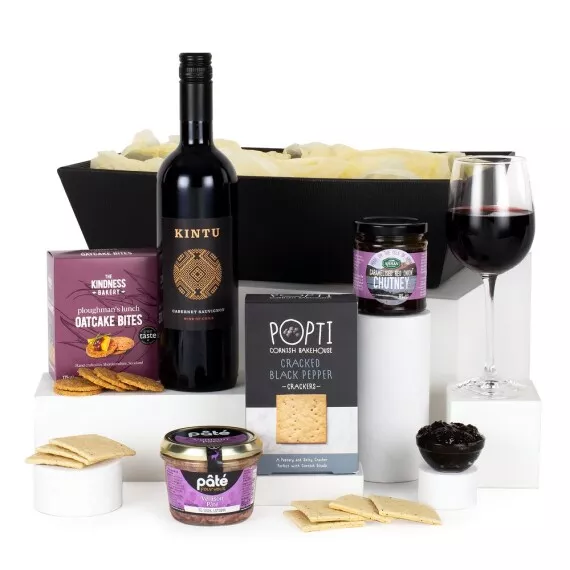 hampers - Wine and Pâté, £35.25 - A selection of deli products including the delicious The Kindness Bakery ploughman's lunch oatcake bites and Arran Fine Foods caramelized red onion chutney.