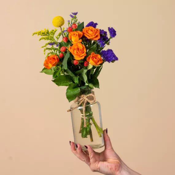 flowers - Bright Posy, £24.99 - Introduce a burst of color with the Bright Posy, a vibrant bouquet that paints a canvas with hues of purple, yellow, orange, and red.