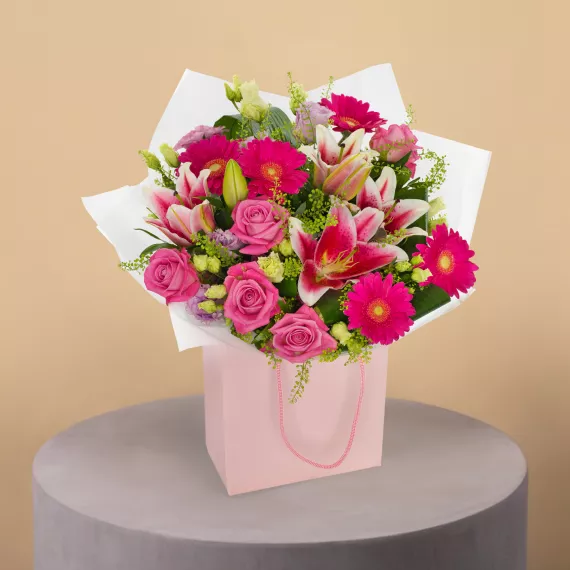 flowers - Pleasant Pinks, £44.99 - This lovely bouquet features soft pink roses, elegant lilies, and cheerful germini.