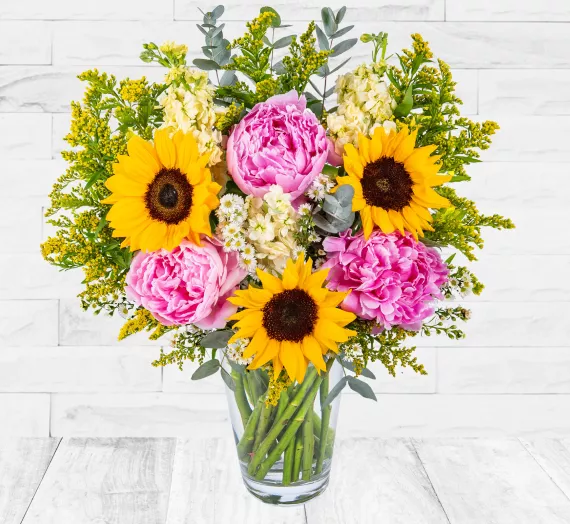 flowers - Sunflowers & Peonies, £26.99 - Introducing our new British-Grown Sunflowers & Peonies bouquet, a beautiful arrangement of the season's favourite stems.