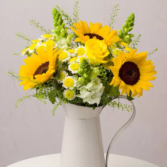 flowers - Summer Joy, £30.50 - A beautiful summertime collection of stunning Sunflowers, pristine white Snapdragon, and a sunny yellow Rose.