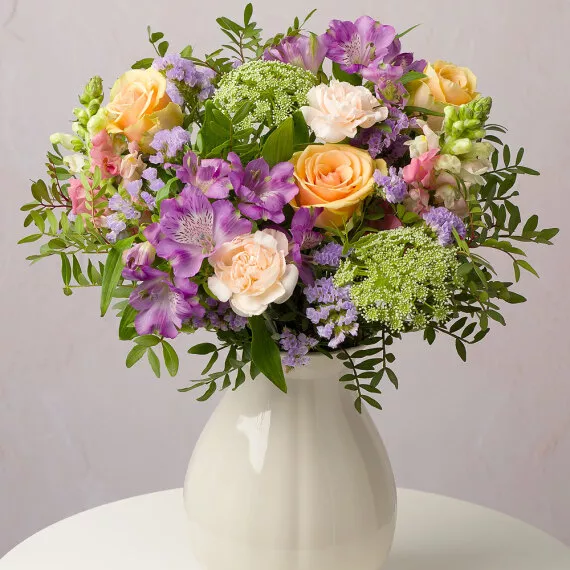 flowers - Enchanted Meadow, £36.35 - A celebration of colorful blooms, our Enchanted Meadow bouquet features peach Roses, delightful cream Carnations, and long-lasting Alstroemeria.