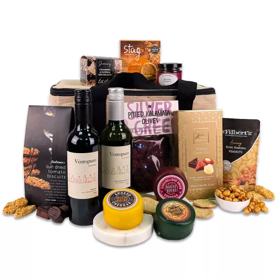 hampers - The Cheese Connoisseur, £50.45 - The Cheese Connoisseur Hamper offers a premium selection of three Mouse House cheddars—Caramelised Onion, Smoked, and Vintage—paired with two half-bottles of Chilean Ventopuro wine.