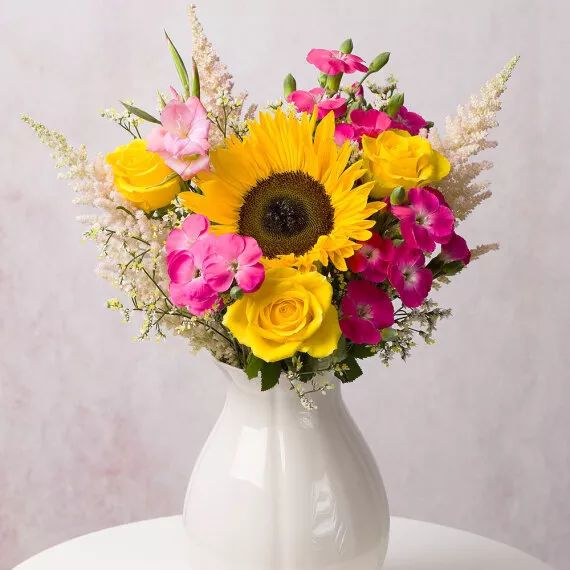 flowers - Summer Sherbet, £30.75 - As sweet as sherbet, this collection of Roses, Carnations, Gladioli, and a stunning Sunflower will brighten any day.