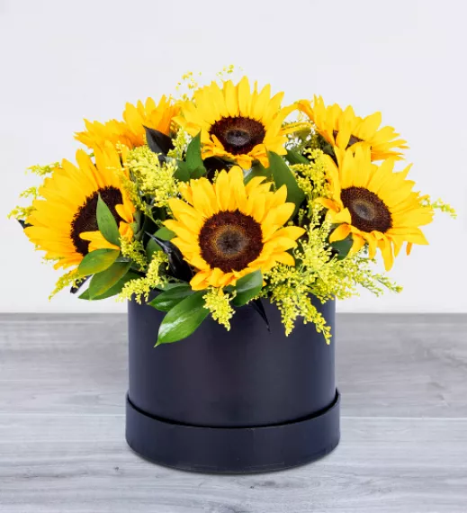 flowers - Sunflower Hatbox, £59.99 - Our Sunflower Hatbox is a radiant gift that brings sunshine to any occasion.