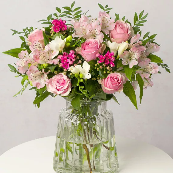 flowers - Strawberry Sundae, £29.50 - A harmonious blend of beauty and grace, our Strawberry Sundae bouquet features Roses, Freesias, and Bouvardia in shades of pink and white.