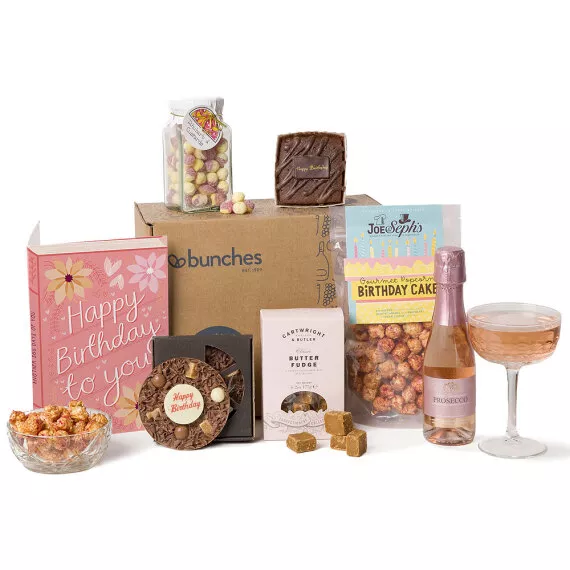 hampers - Pink Prosecco Birthday Treats Hamper, £32.45 - Make their birthday sparkle with this elegant hamper featuring chocolates, delicious goodies, and celebratory prosecco.